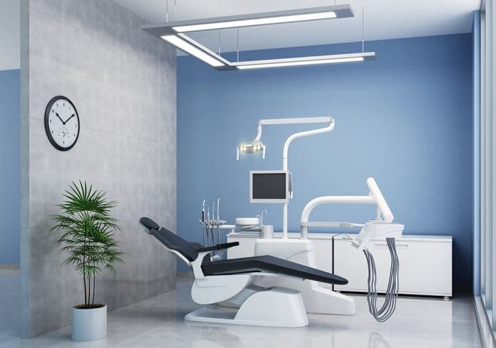 Friendly dentist consulting with a patient at Dentistree Dental Clinic